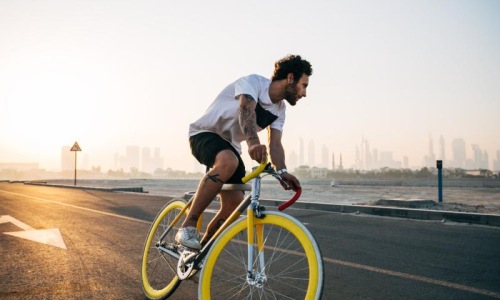 Find your perfect fit at The Core a man riding a bicycle on a road