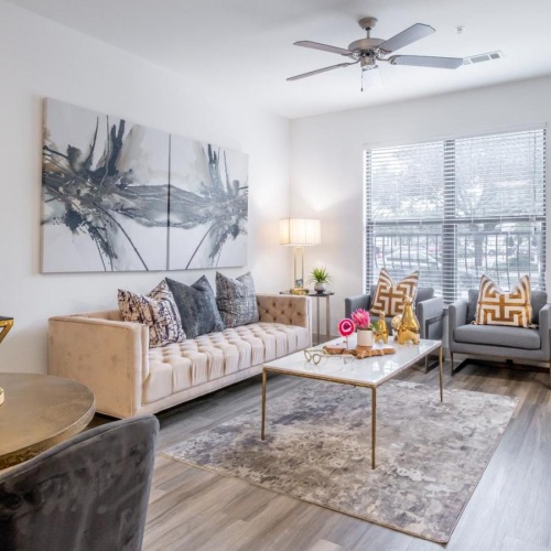 Spacious living areas to recline and recharge a living room with a couch and a table