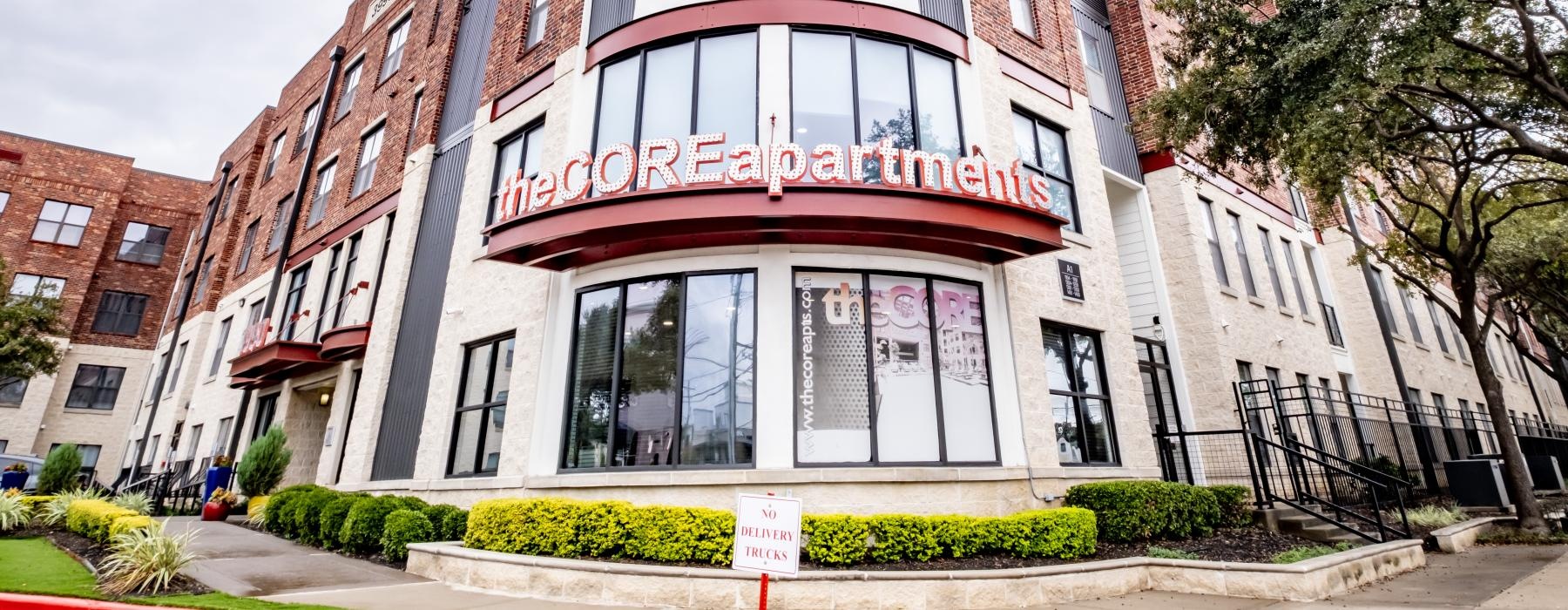 a large building with a sign in front of it